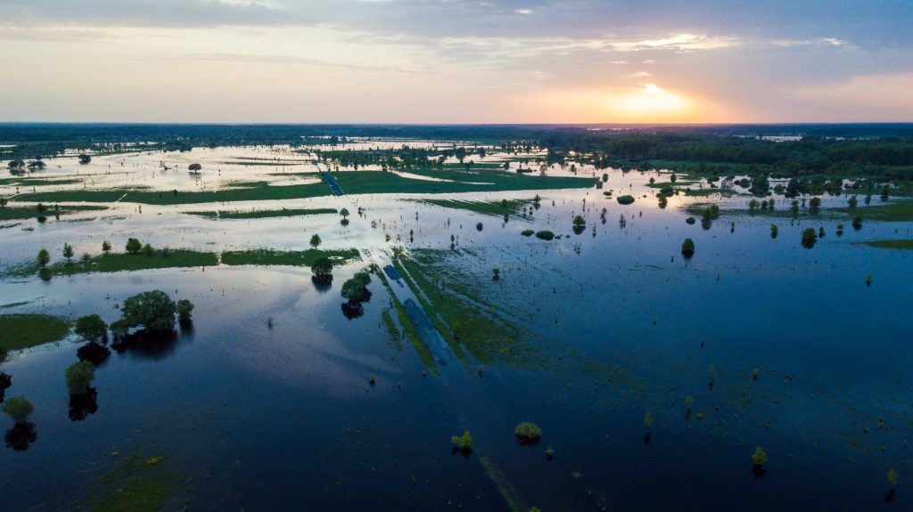 Aerial view of rural flooding at sunset